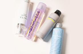 Assorted body sprays including Kenneth Cole Reaction, Tommy Bahama Maritime, Moonlight, and White, displayed on a light background.