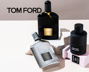Tom Ford fragrance bottles styled on a minimalist display with brand logo.