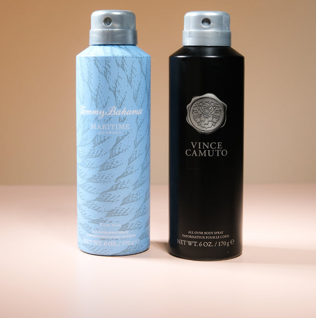 Tommy Bahama and Vince Camuto body sprays on a warm beige background.